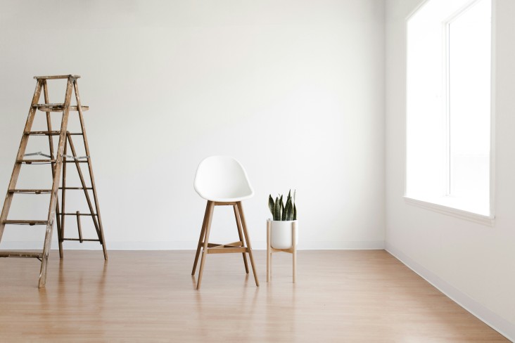 Ladder and chair in room